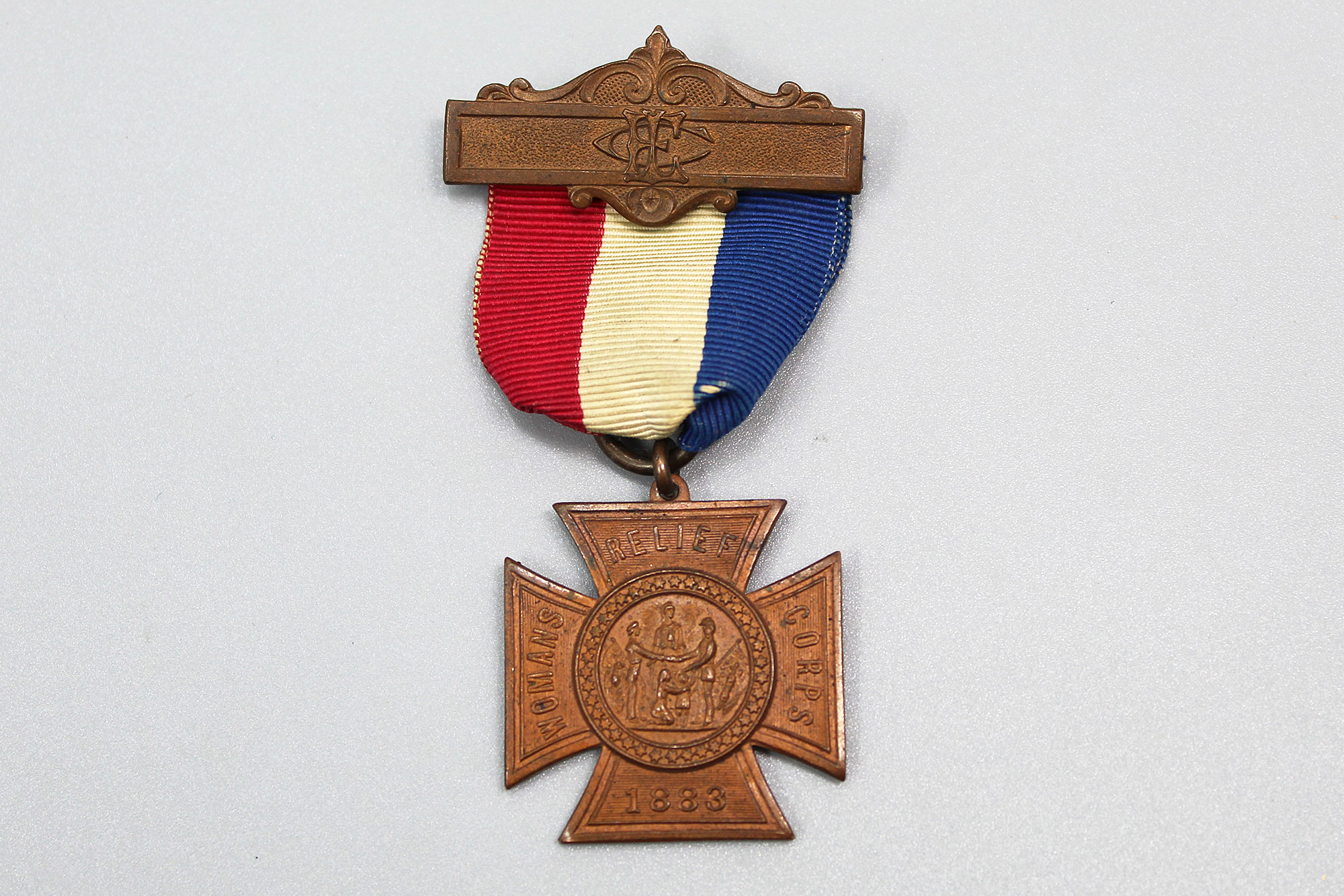 Us national women s relief corps medal 1883 auxiliary to the gar
