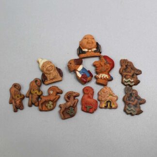 WW2 German Clay Series Group of 12 WHW Tinnies (No Pins) . PIN3827
