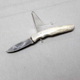 Knife marked Ratterree w/White Antler Handle . DW145